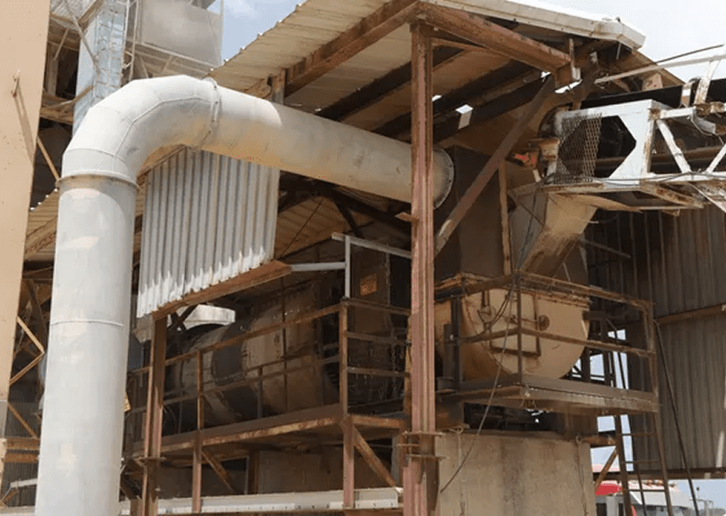 Industrial machinery with pipes and metal structures.